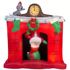 Gemmy 5 ft. W x 5.6 ft. H  Inflatable Santa's Head Popping Down at Fireplace Scene