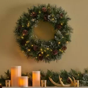 Noble House 24 in. Battery Operated Pre-Lit LED Artificial Christmas Wreath with Snowy Branches and Pinecones
